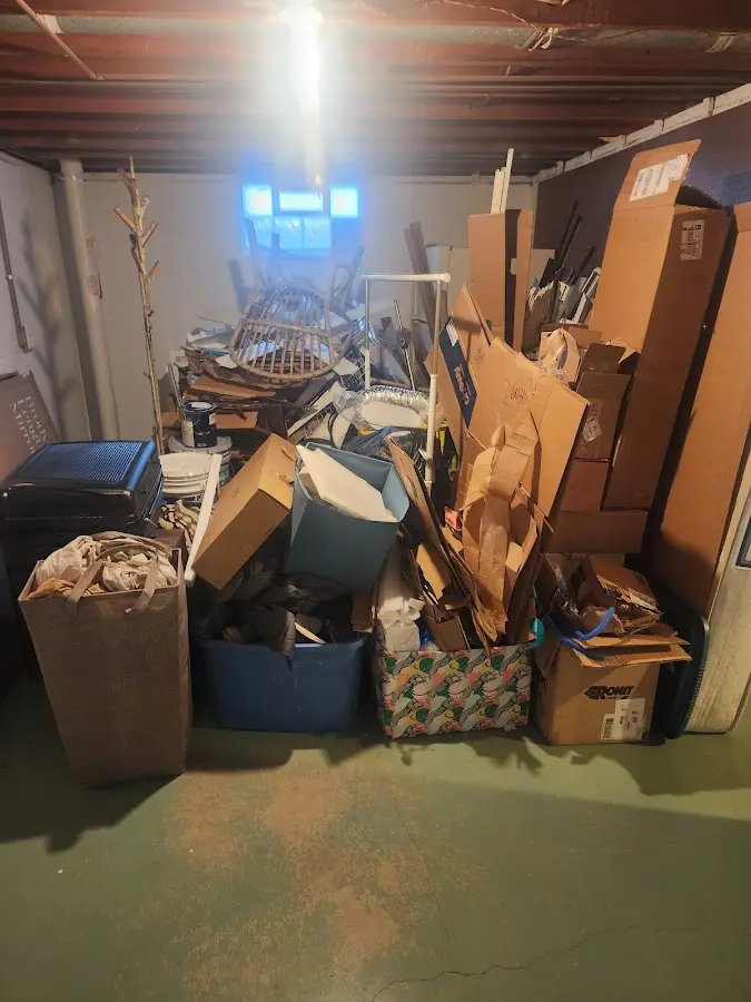 Roll-off dumpster container at job site for 2 Yard Dumpster Rental in Bennettsville